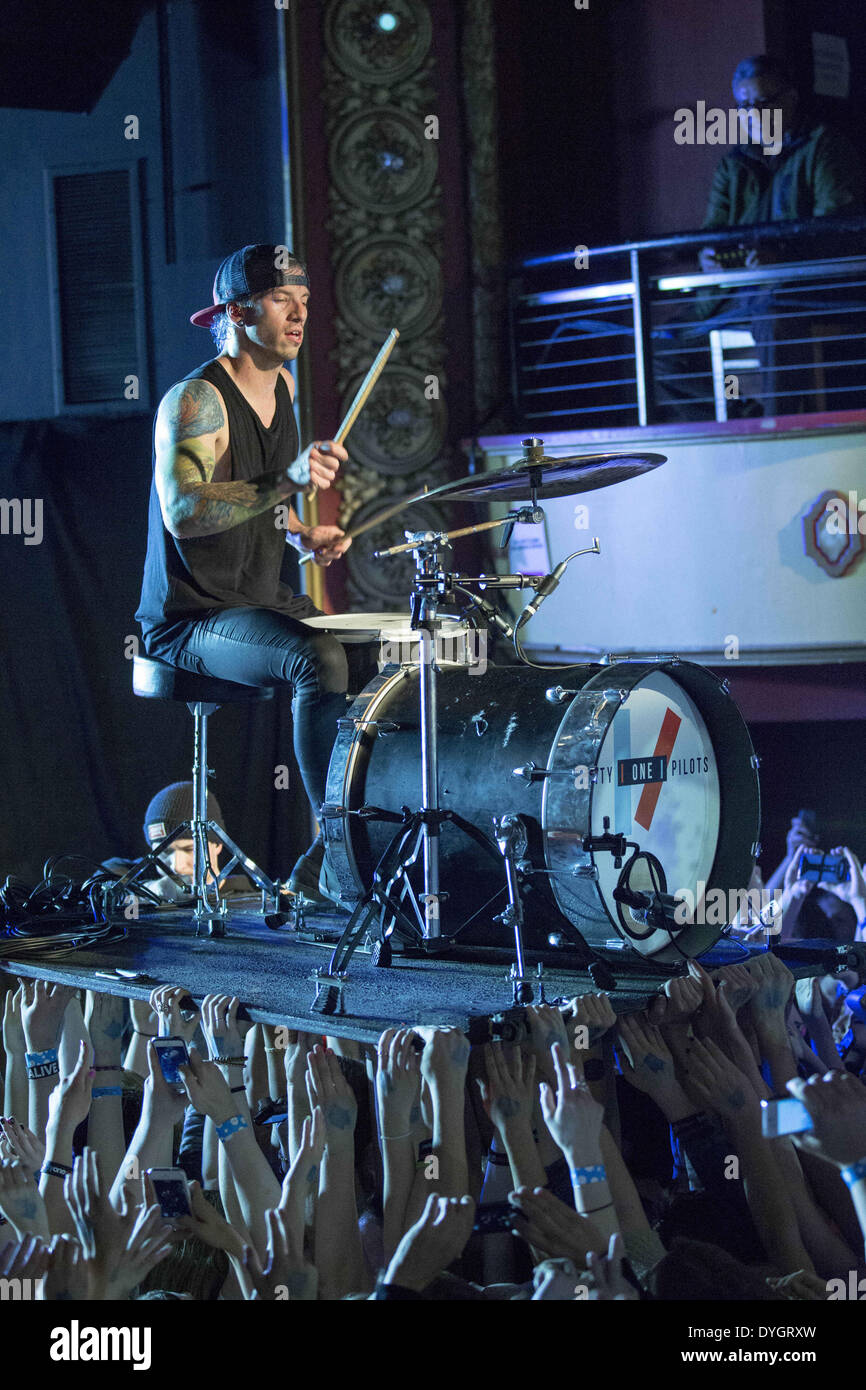 Madison, Wisconsin, USA. 16th Apr, 2014. JOSH DUN of Twenty One Pilots  performs as he is lifted above the crowd on his drum platform at the  Majestic Theater in Madison, Wisconsin ©