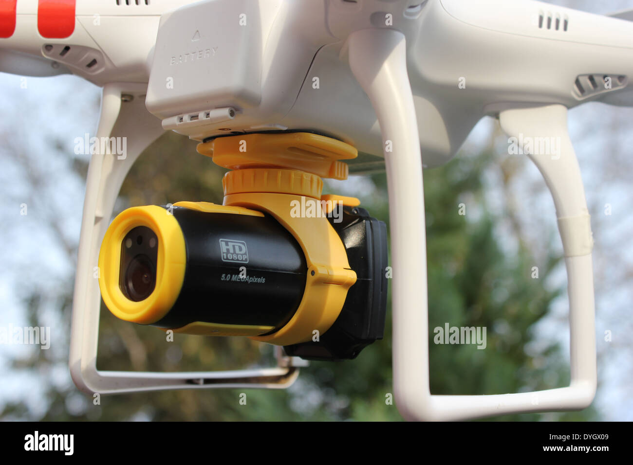 Video flight: Modern Full-HD action cam fixed under a remote controlled multicopter Stock Photo