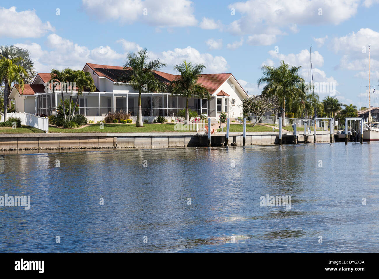 Luxury Residential Canal Front Home with Screened in Pool Deck and Private Dock,, Punta Gorda, FL, USA Stock Photo