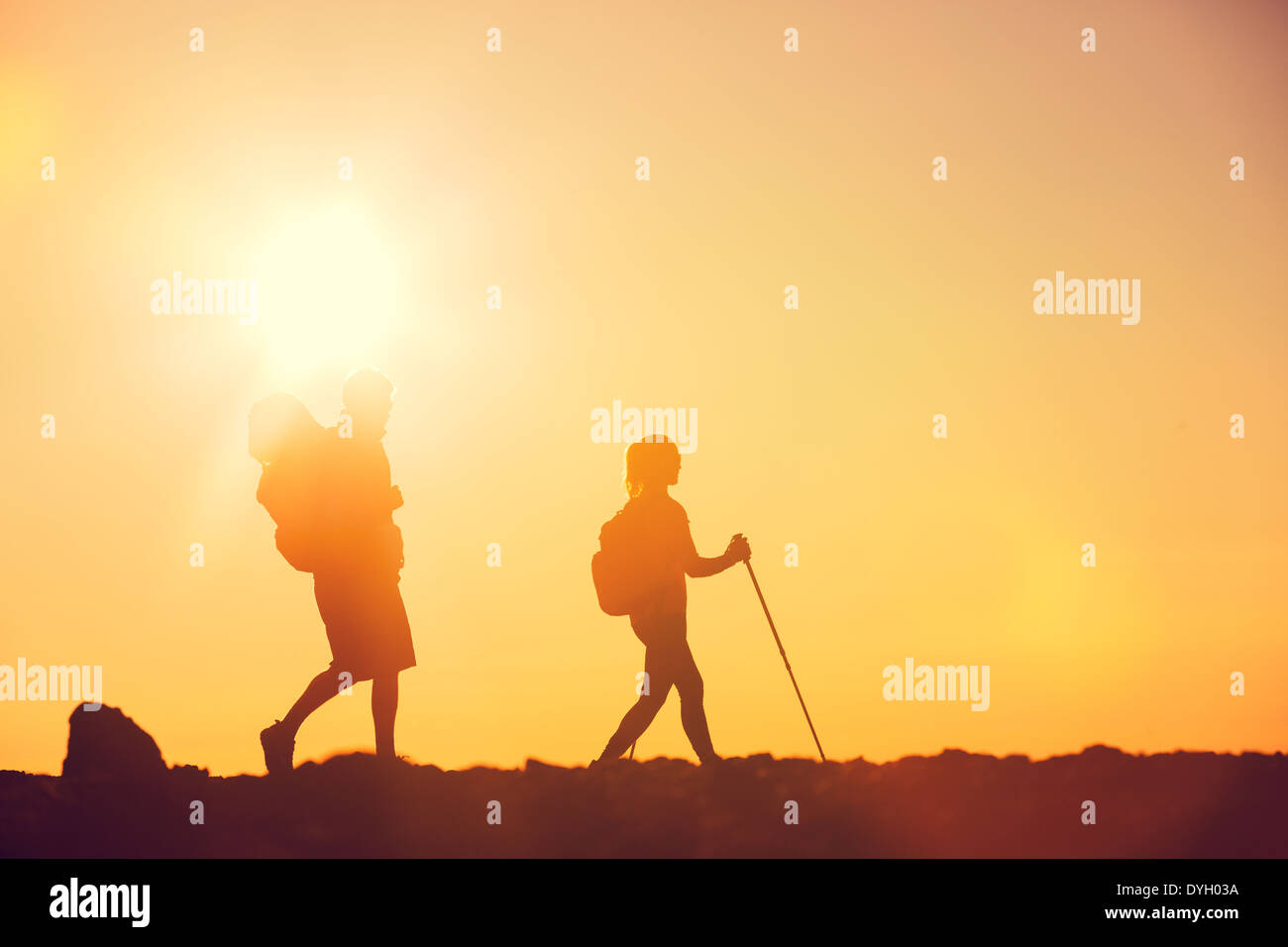 Silhouette couple hikers hi-res stock photography and images - Alamy
