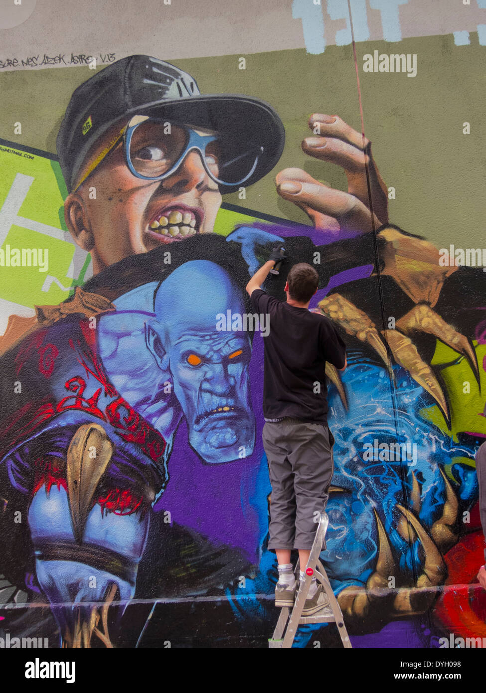 Paris, France, Young French Graffitti Artist Painting Wall Stock Photo ...