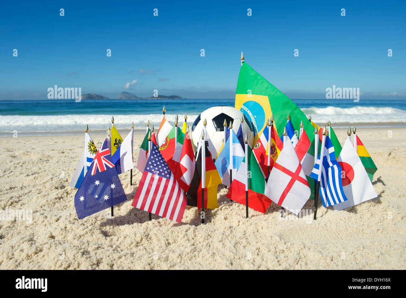 International football country flags with soccer ball on Ipanema beach in Rio de Janeiro Brazil Stock Photo