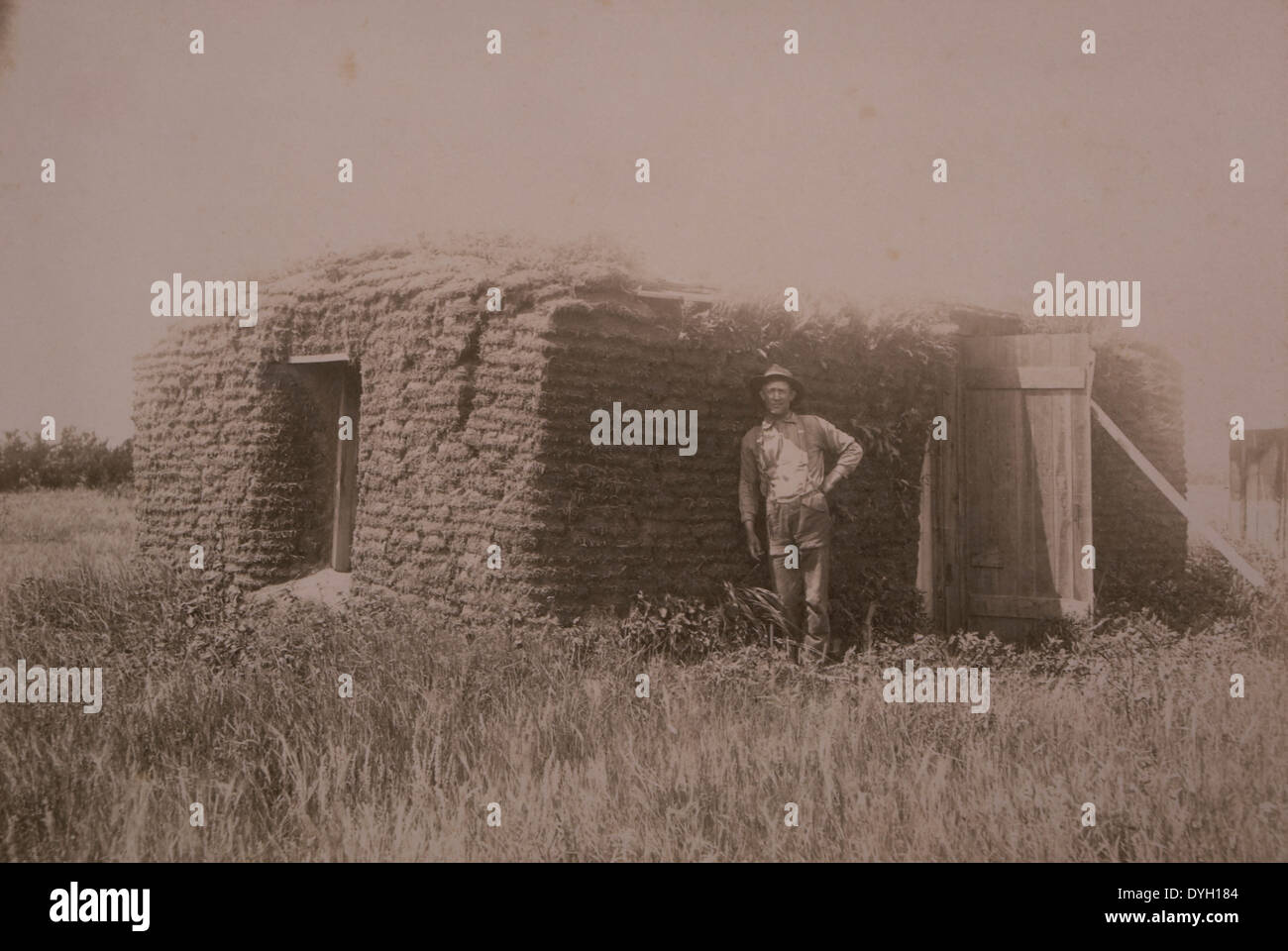 Man Standing Near his Sod House, North Dakota, USA, circa 1889 Stock Photo
