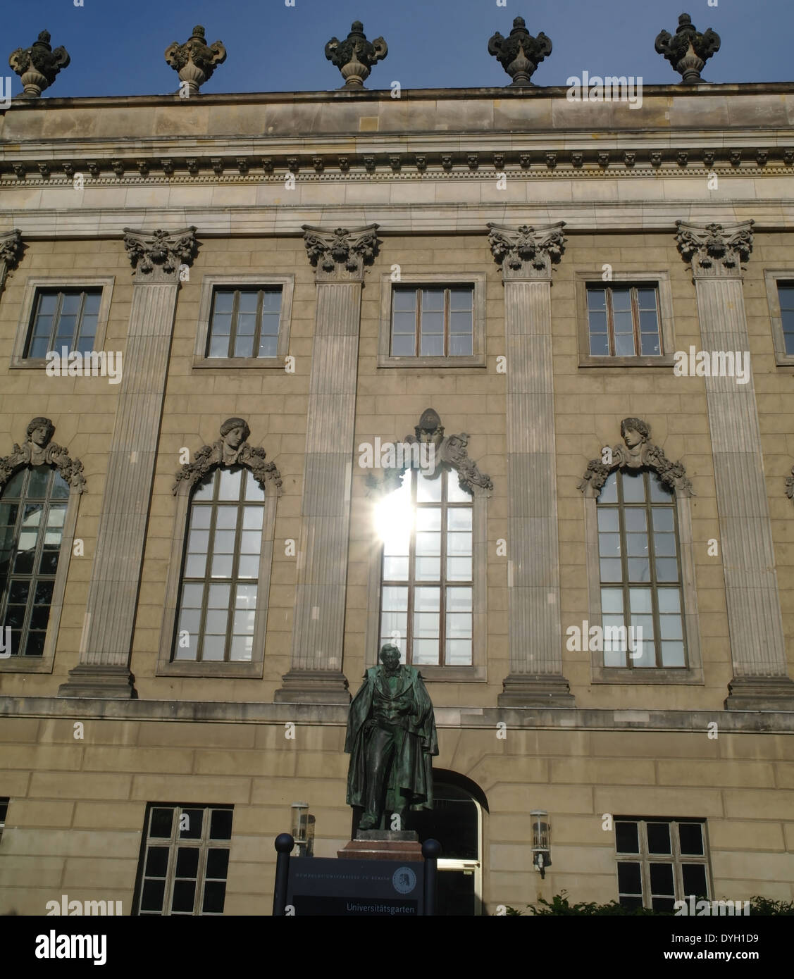 Blue sky view statue chemist Eilhard Mitscherlich, and sun shining