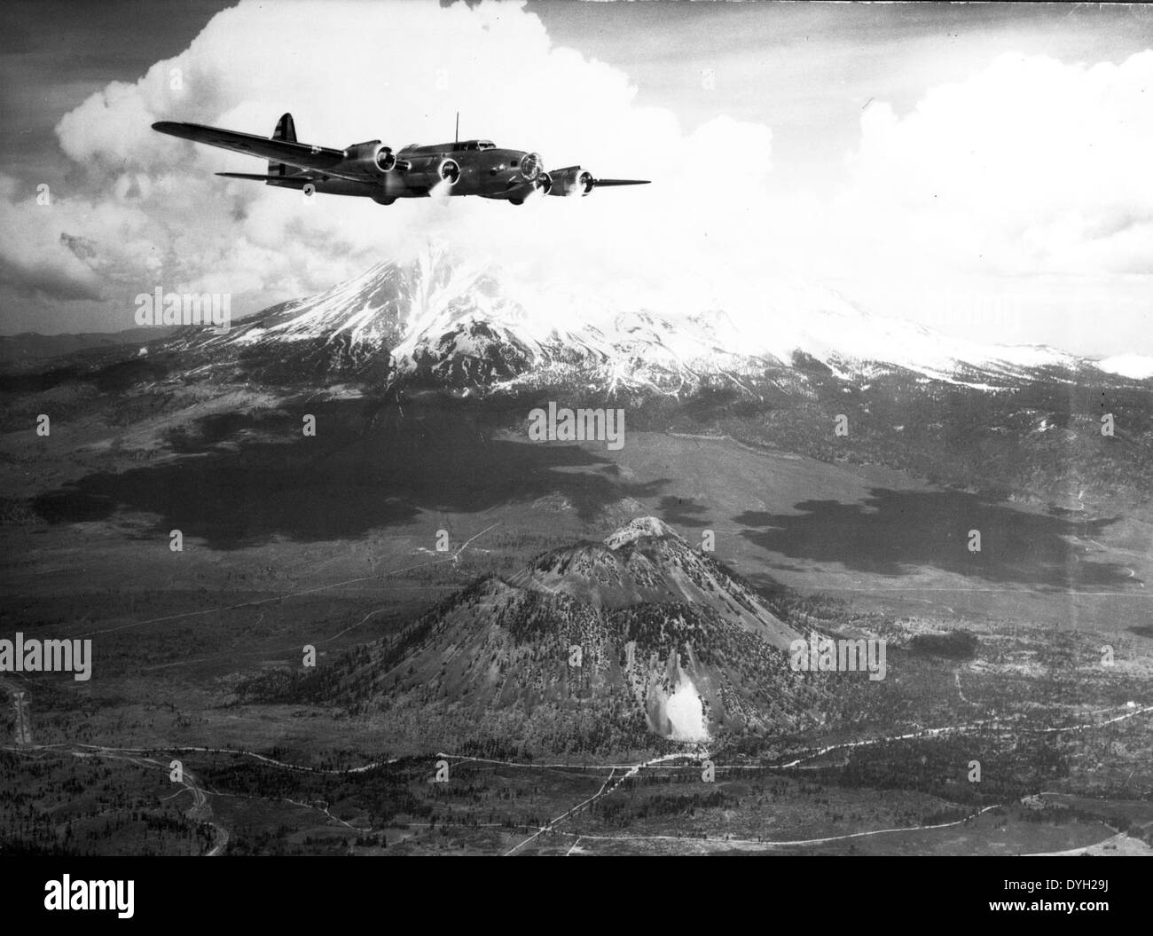 The Boeing Y1B-17, a precursor to the iconic B-17 Flying Fortress, was a U.S. military bomber developed in the late 1930s. It was involved in early flight testing and helped pave the way for the development of heavy bombers during World War II. The aircraft flew over Mount Rainier on February 28, 1938, as part of its test operations. Stock Photo