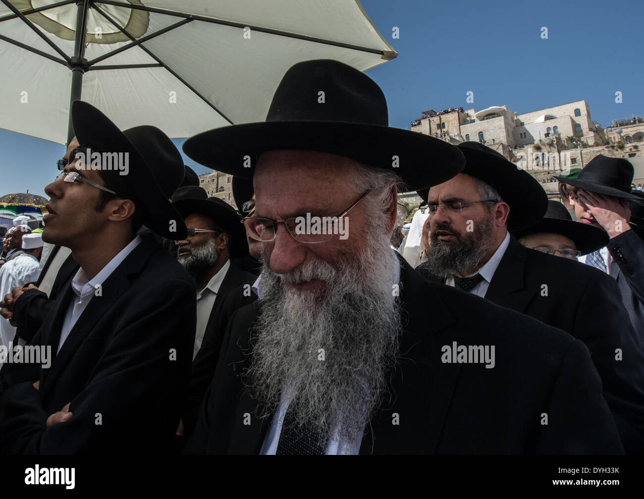 (140418) -- JERUSALEM, April 18, 2014 (Xinhua) -- Jews pray at the Western Wall in the Old City of Jerusalem, on April 17, 2014. Passover is an important Biblically-derived Jewish festival celebrated from April 14 to April 21 this year. The Jewish people celebrate Passover as a commemoration of their liberation over 3,300 years ago by God from slavery in ancient Egypt that was ruled by the Pharaohs, and their freedom as a nation under the leadership of Moses. It commemorates the story of the Exodus as described in the Hebrew Bible especially in the Book of Exodus, in which the Israelites were Stock Photo