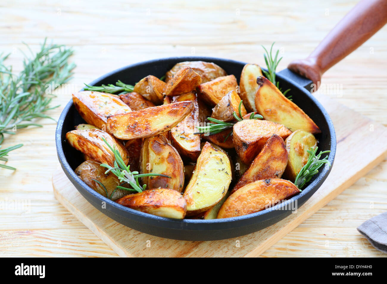 fried potatoes in their skins, food Stock Photo Alamy