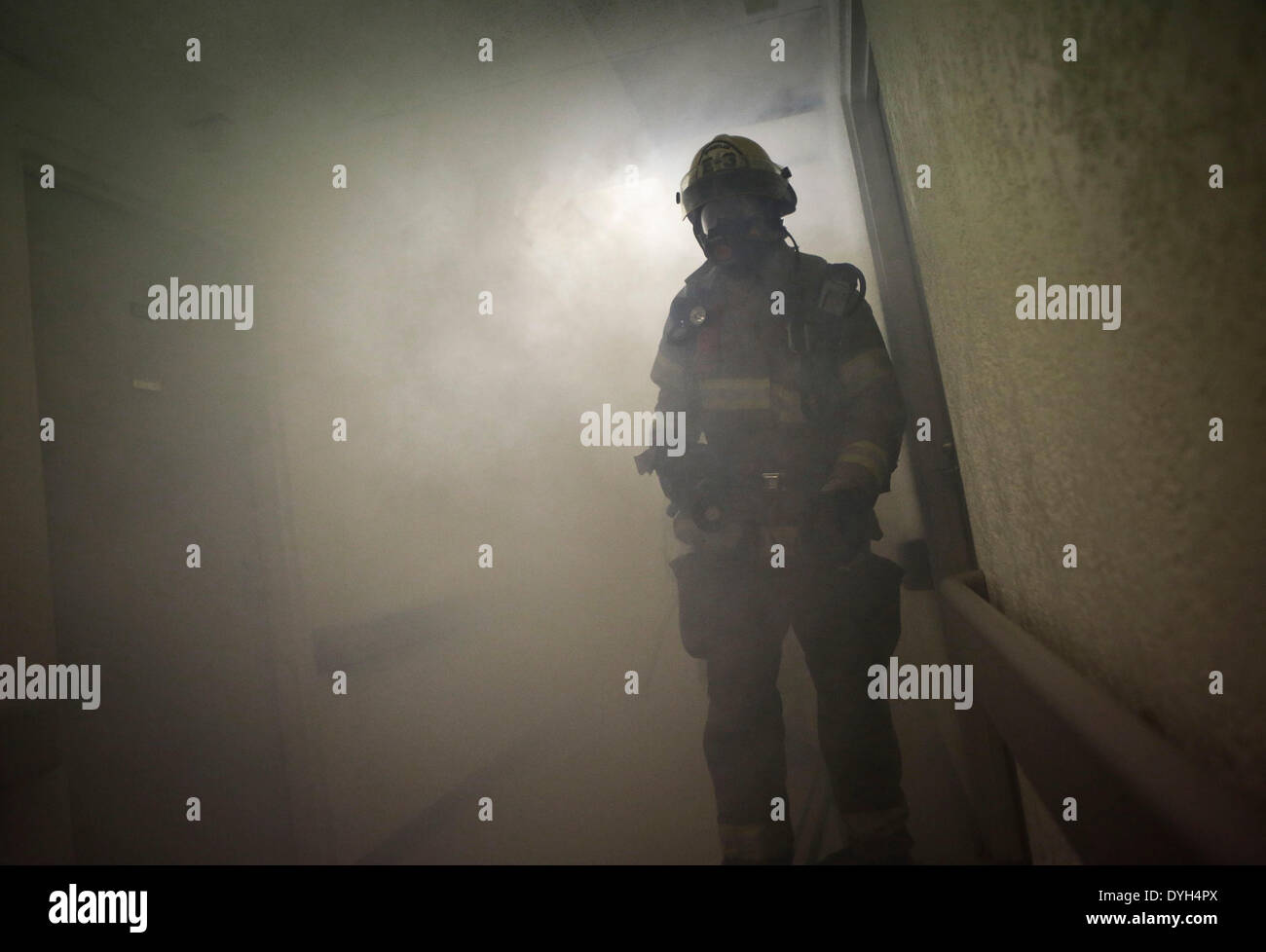 Vancouver, Canada. 17th Apr, 2014. A firefighter searches for survivors ...