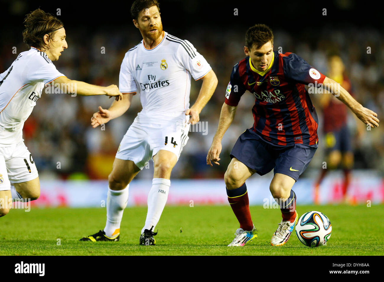 Valencia, Spain. © D. 16th Apr, 2014. Luka Modric, Xabi Alonso (Real), Lionel Messi (Barcelona) Football/Soccer : Copa del Rey final match between FC Barcelona 1-2 Real Madrid at Mestalla stadium in Valencia, Spain. Credit:  D .Nakashima/AFLO/Alamy Live News Stock Photo
