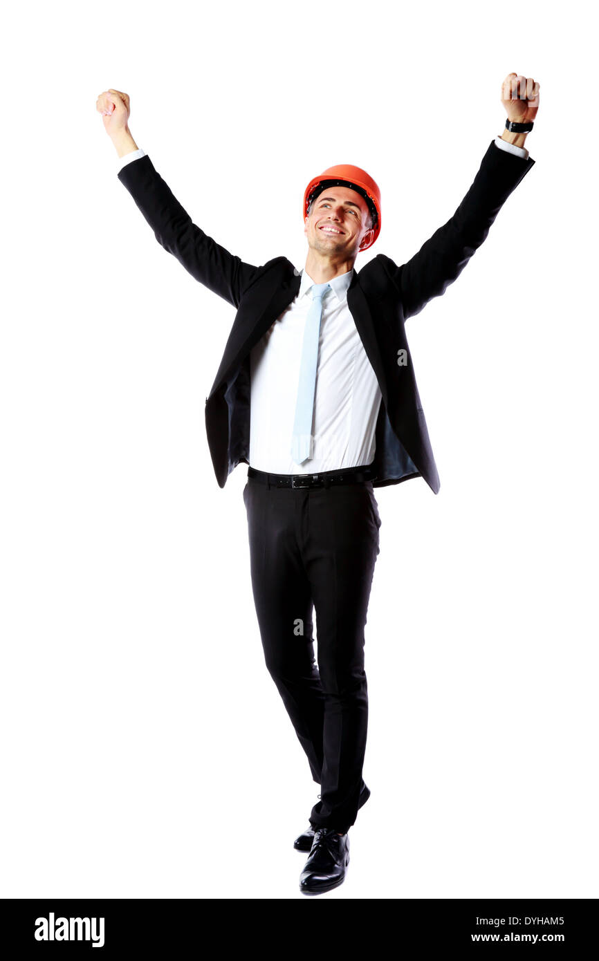 Happy businessman with hands raised over white background Stock Photo ...
