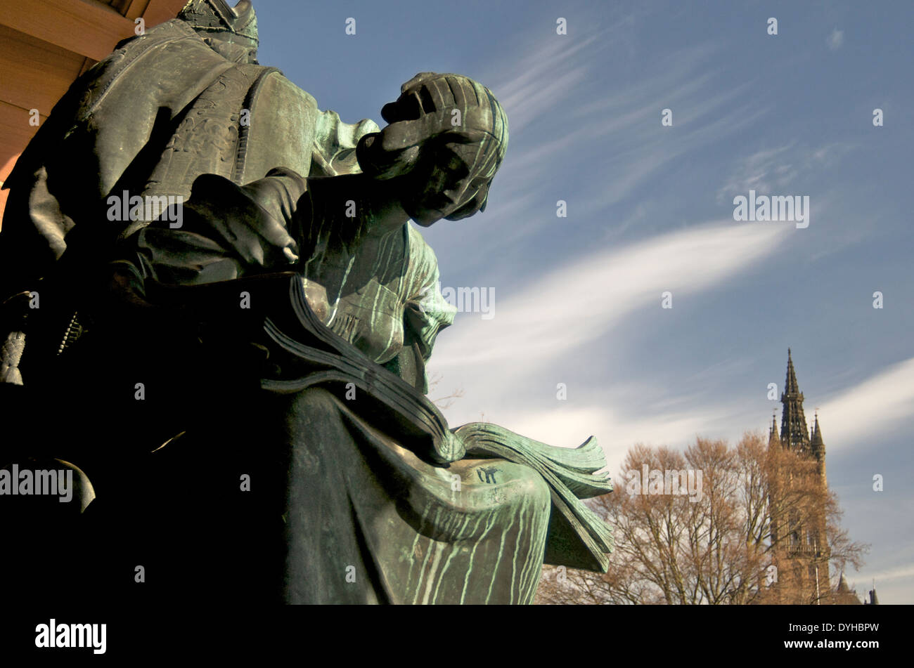 Statue at the entrance to Kelvingrove Art Gallery And Museum with University of Glasgow spire in the background. Stock Photo
