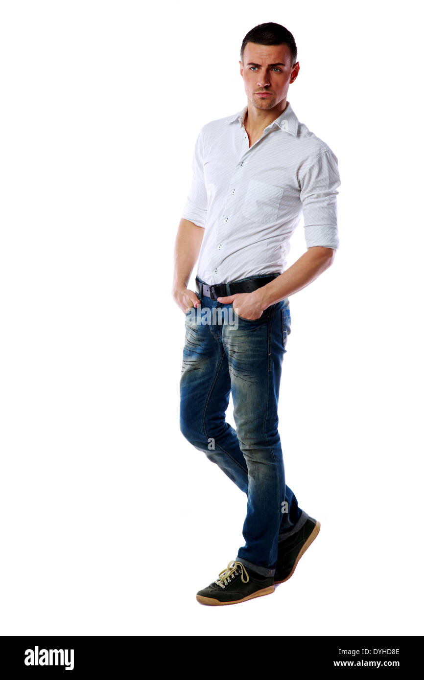 Full-length portrait of a pensive man standing over white background Stock Photo