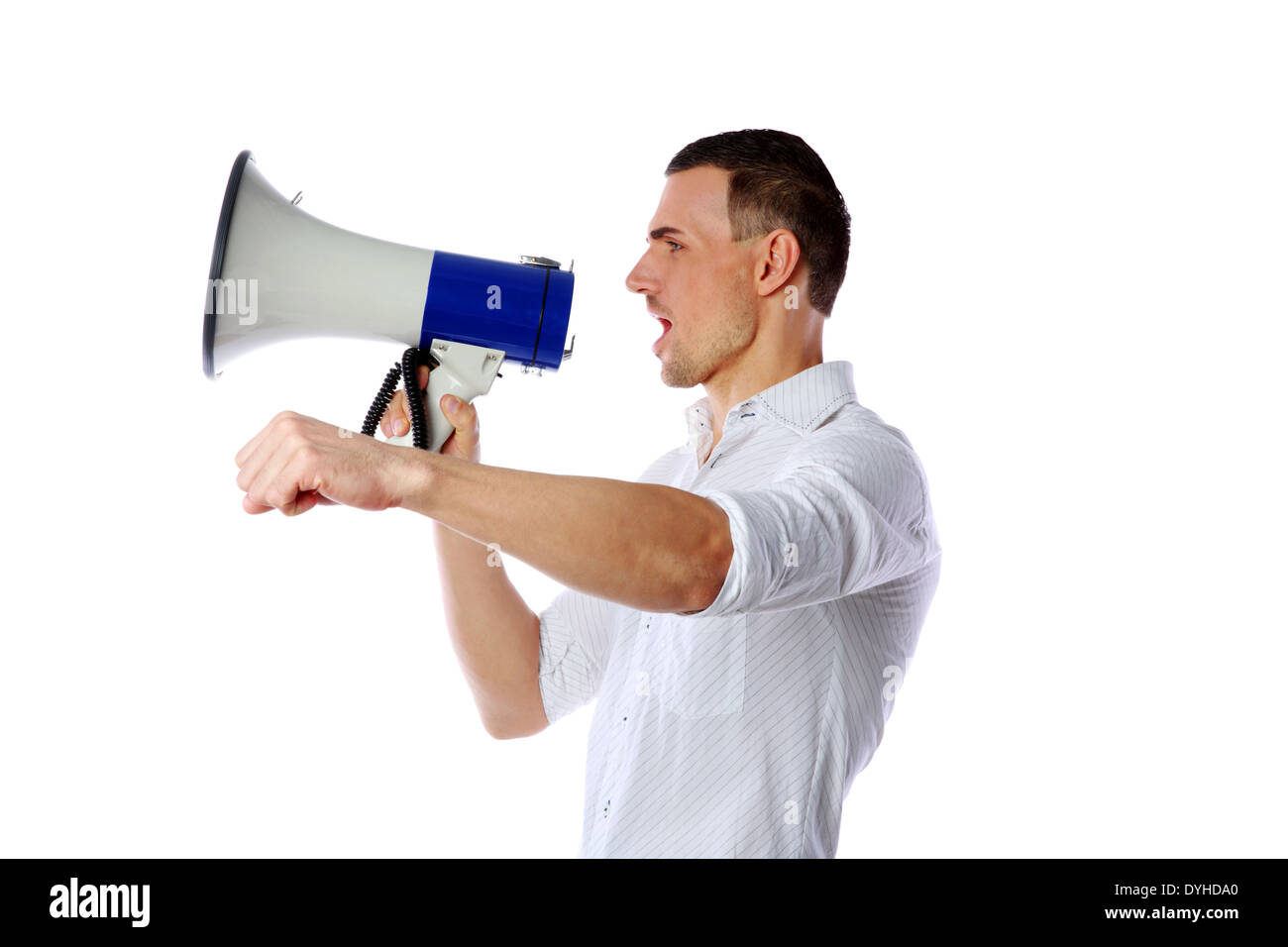 Man shouting through megaphone over white background Stock Photo - Alamy