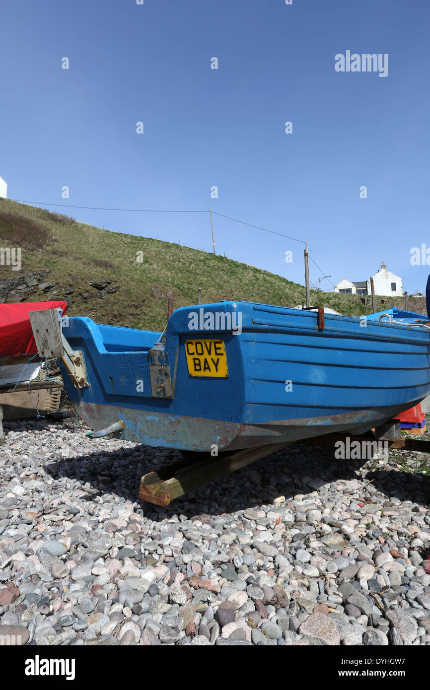 Small fishing boats at the picturesque harbour at Cove Bay, Aberdeen city, Scotland, UK Stock Photo