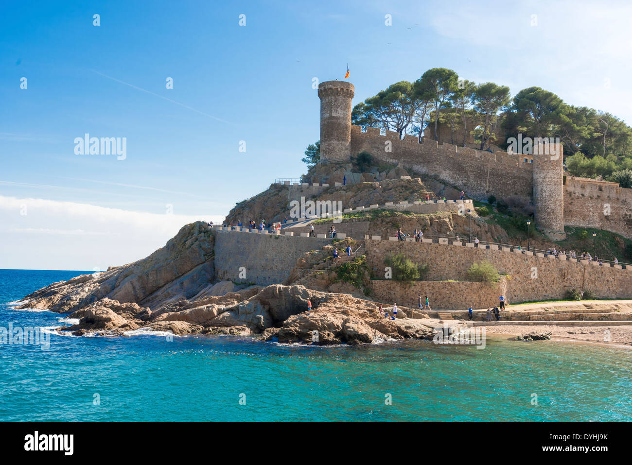 Tossa de Mar, Spain - October 13: Tourist at the beach and medieval castle in Tossa de Mar, Catalonia, Spain, Costa Brava Stock Photo