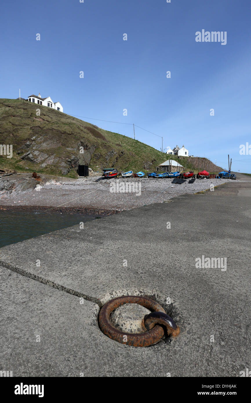 Fishing boat anchor points at the picturesque harbour at Cove Bay