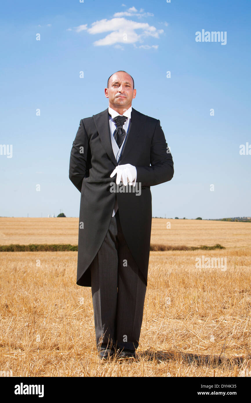 Butler on the middle of a dry field. Stock Photo