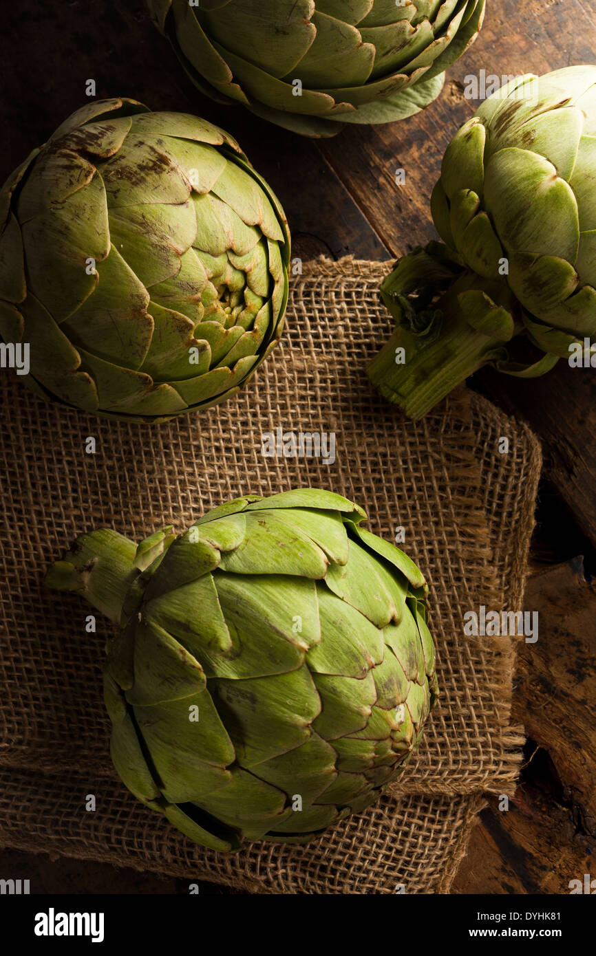 Raw Organic Green Artichokes on a Background Stock Photo Alamy