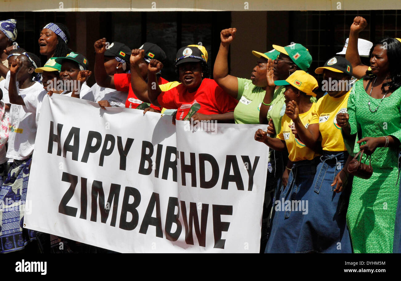Harare, Zimbabwe. 18th Apr, 2014. Zimbabweans uphold a banner saying