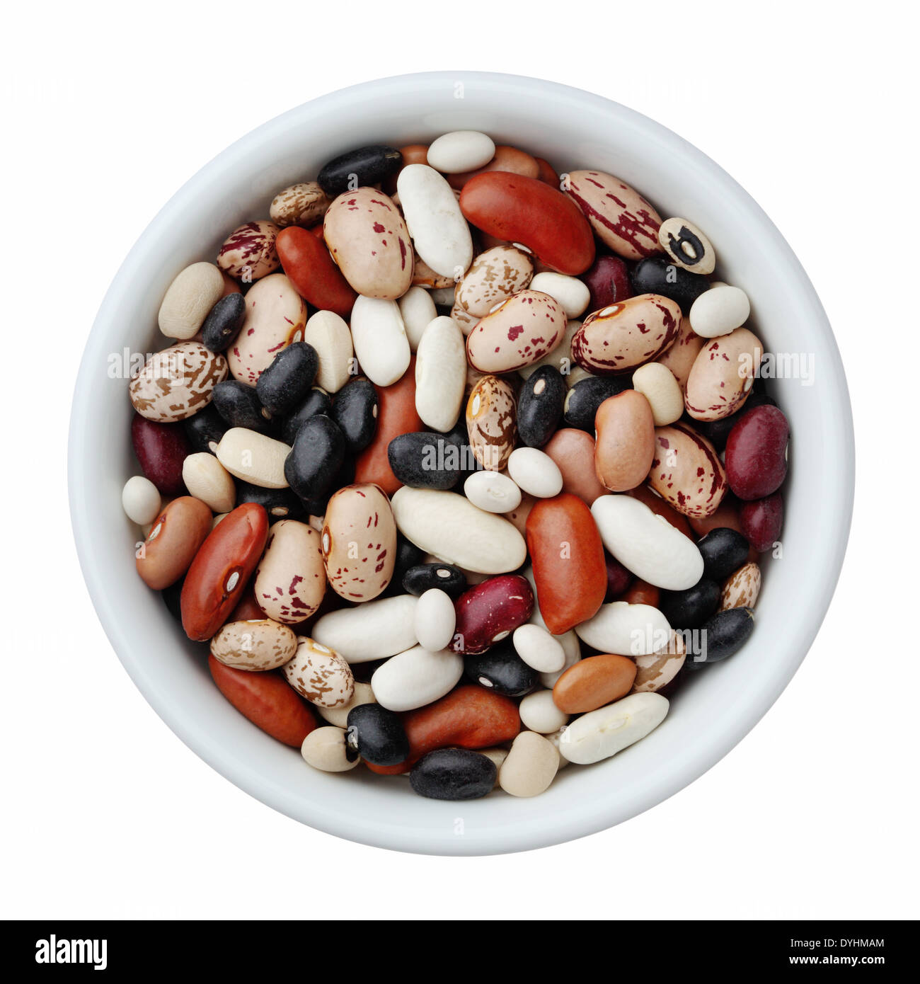 Assorted dried beans in a bowl isolated on white background Stock Photo