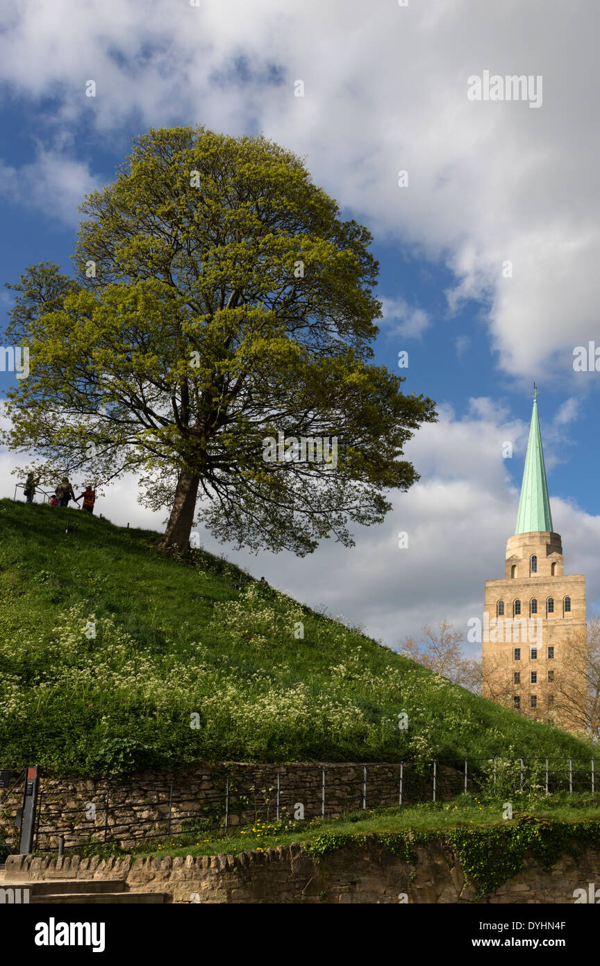 The castle mound in Oxford city centre with  the tower of Nuffield College in the background Stock Photo