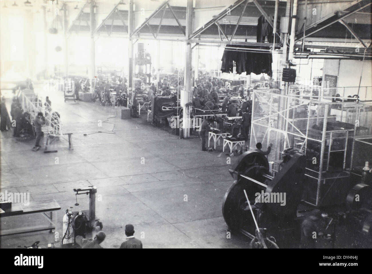 This image depicts the interior of a factory, showcasing the production ...