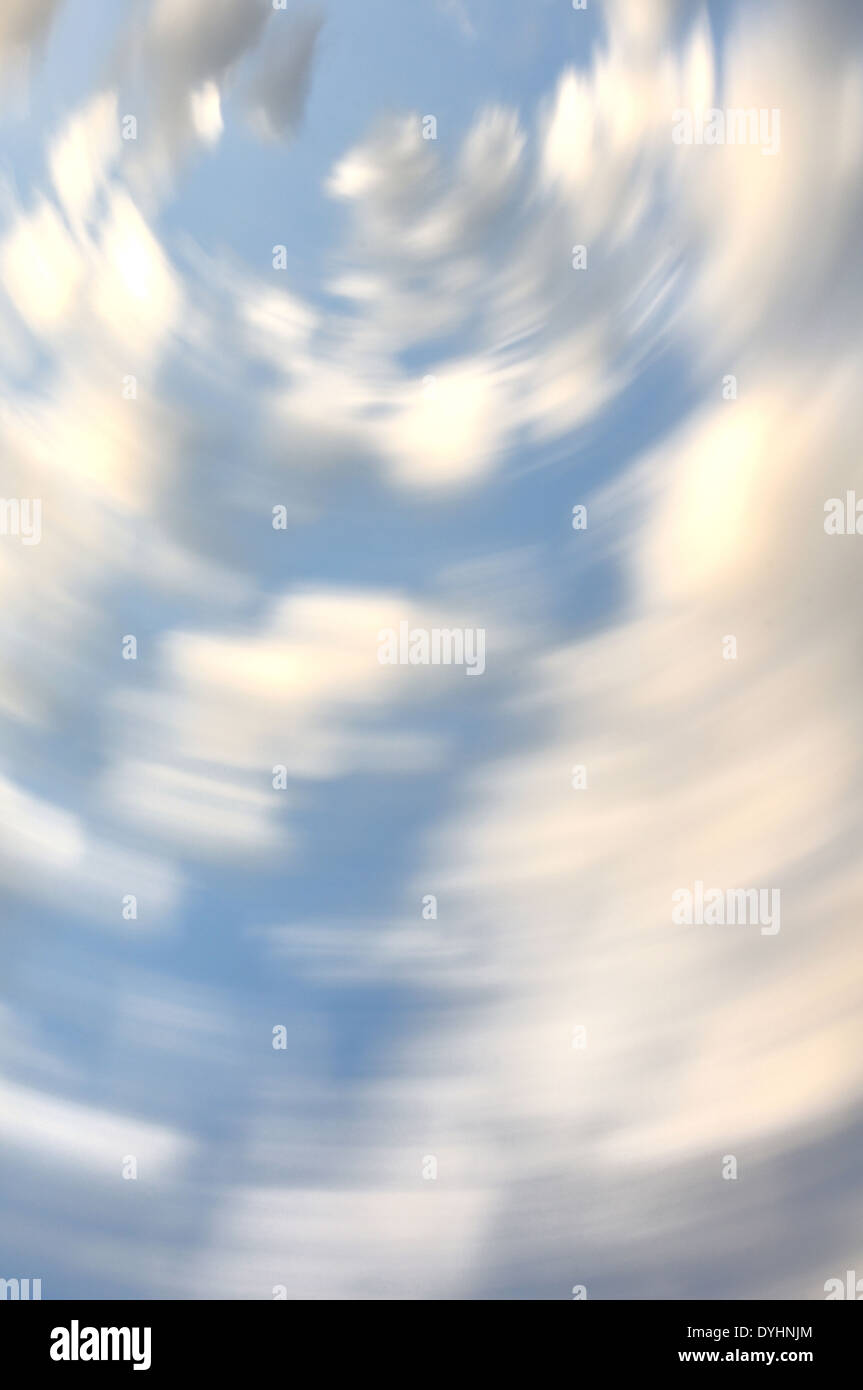 Blurred view of clouds on a blue sky. Stock Photo