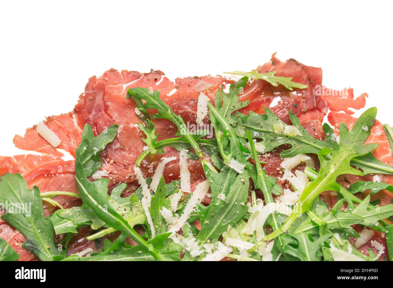 Beef Carpaccio with rucola and Parmesan cheese , isolated Stock Photo
