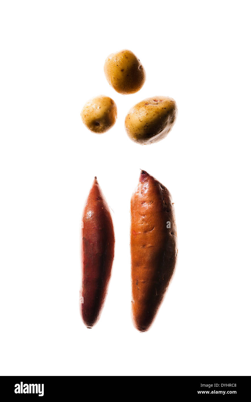 Yams and Potatoes on White Background Stock Photo Alamy