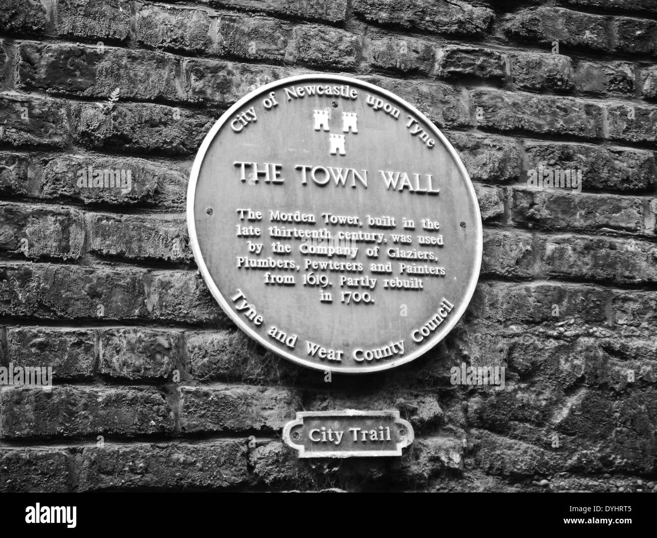Monochrome image - Plaque depicting historic / medieval Town Wall , City Trail, Newcastle upon Tyne, England, UK Stock Photo