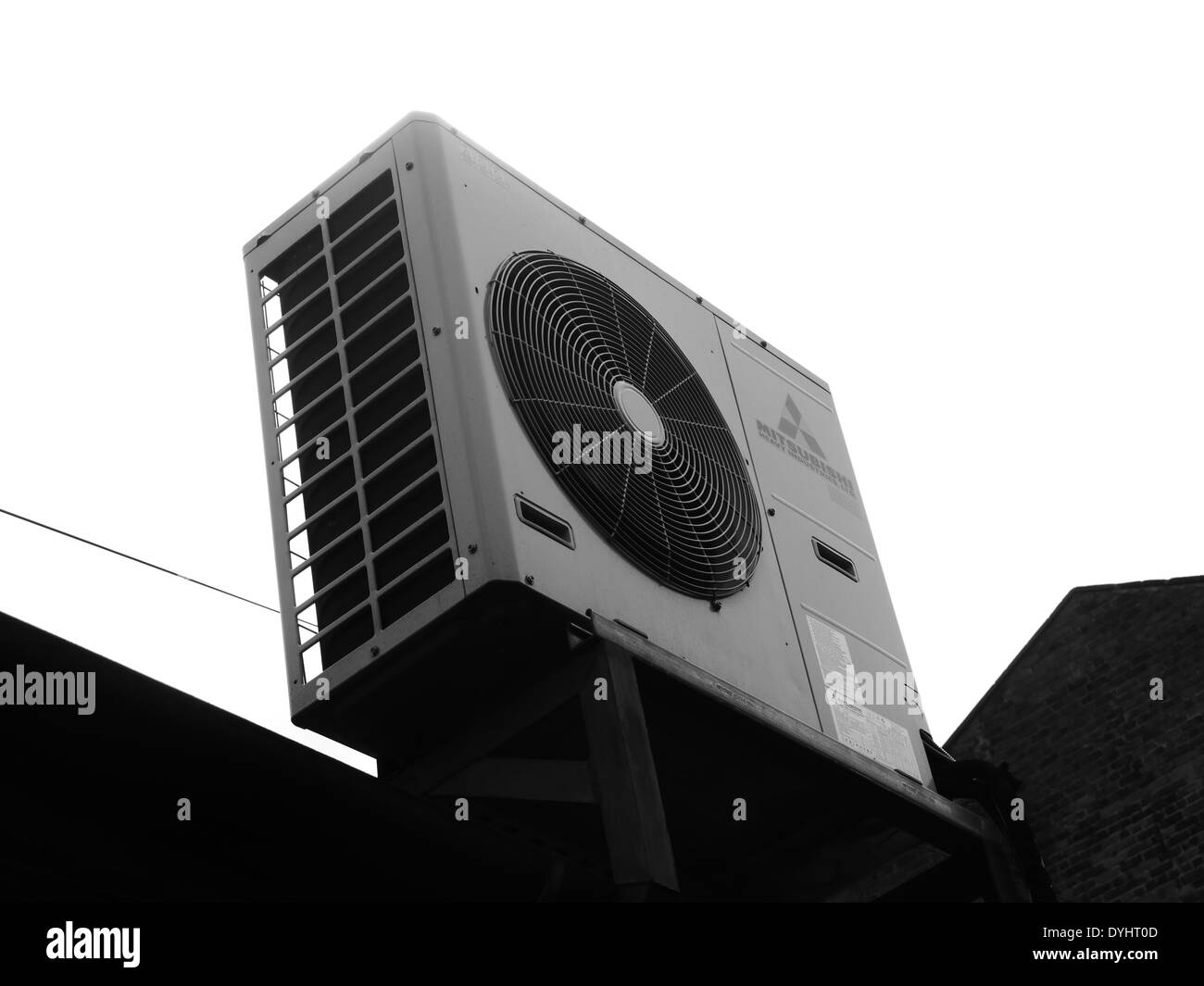 Monochrome image - Urban street scene showing ventilation / extractor fan on food premises, Newcastle upon Tyne, England Stock Photo