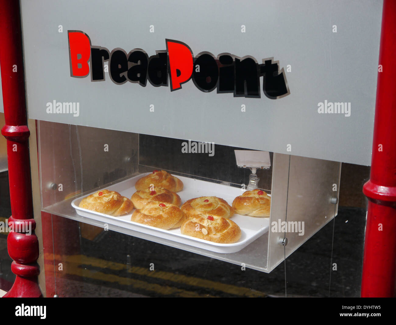 Sweet rolls / cherry / chelsea buns in 'Bread point' shop window