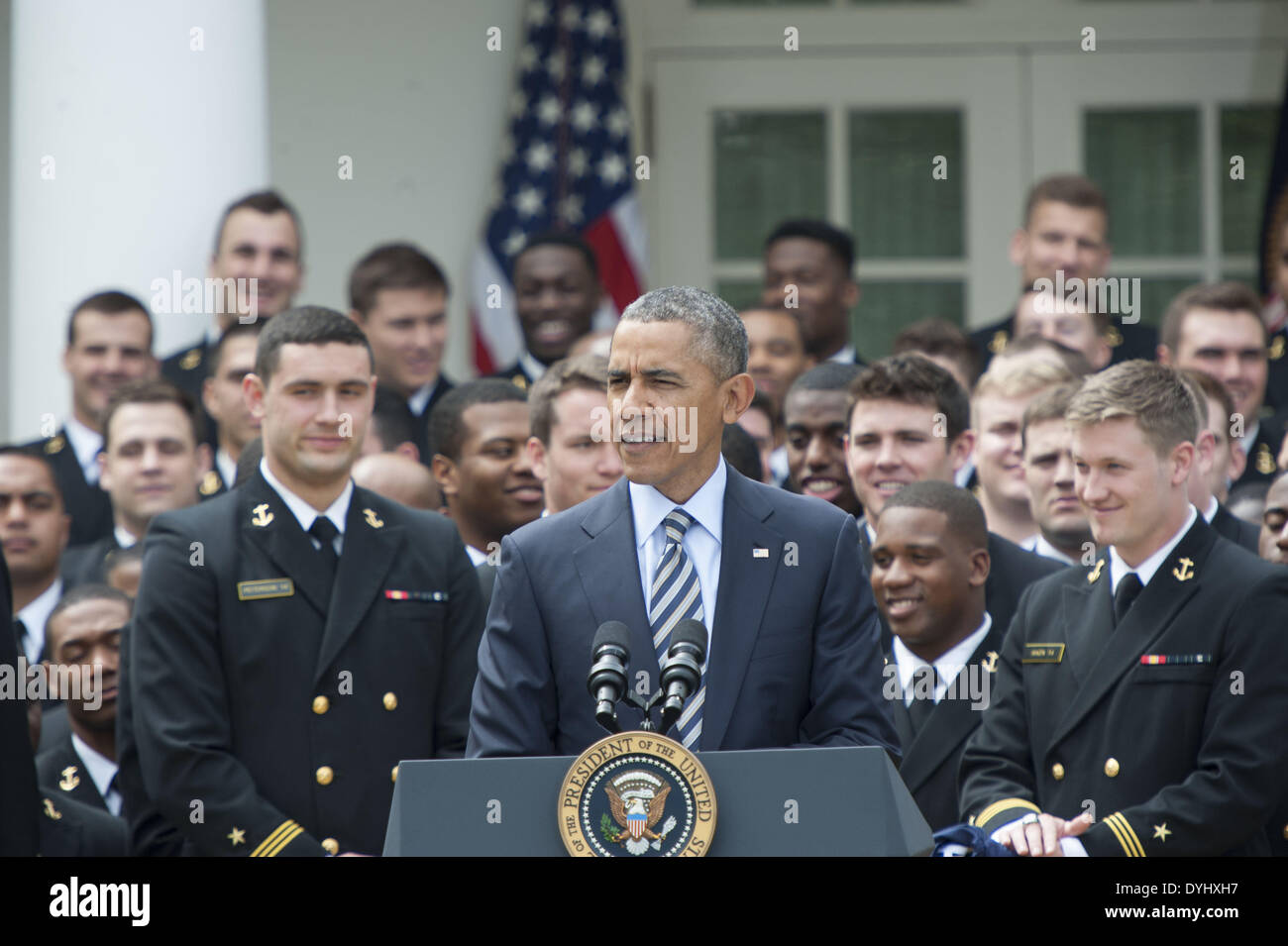 Washington, District Of Columbia, USA. 18th Apr, 2014. PRESIDENT OBAMA welcomes the Naval Academy Midshipmen Football Team to the White House to present them with the 2013 Commander-in-Chief Bowl. The ceremony was held in the Rose Garden of the White House Credit:  Ricky Fitchett/ZUMAPRESS.com/Alamy Live News Stock Photo