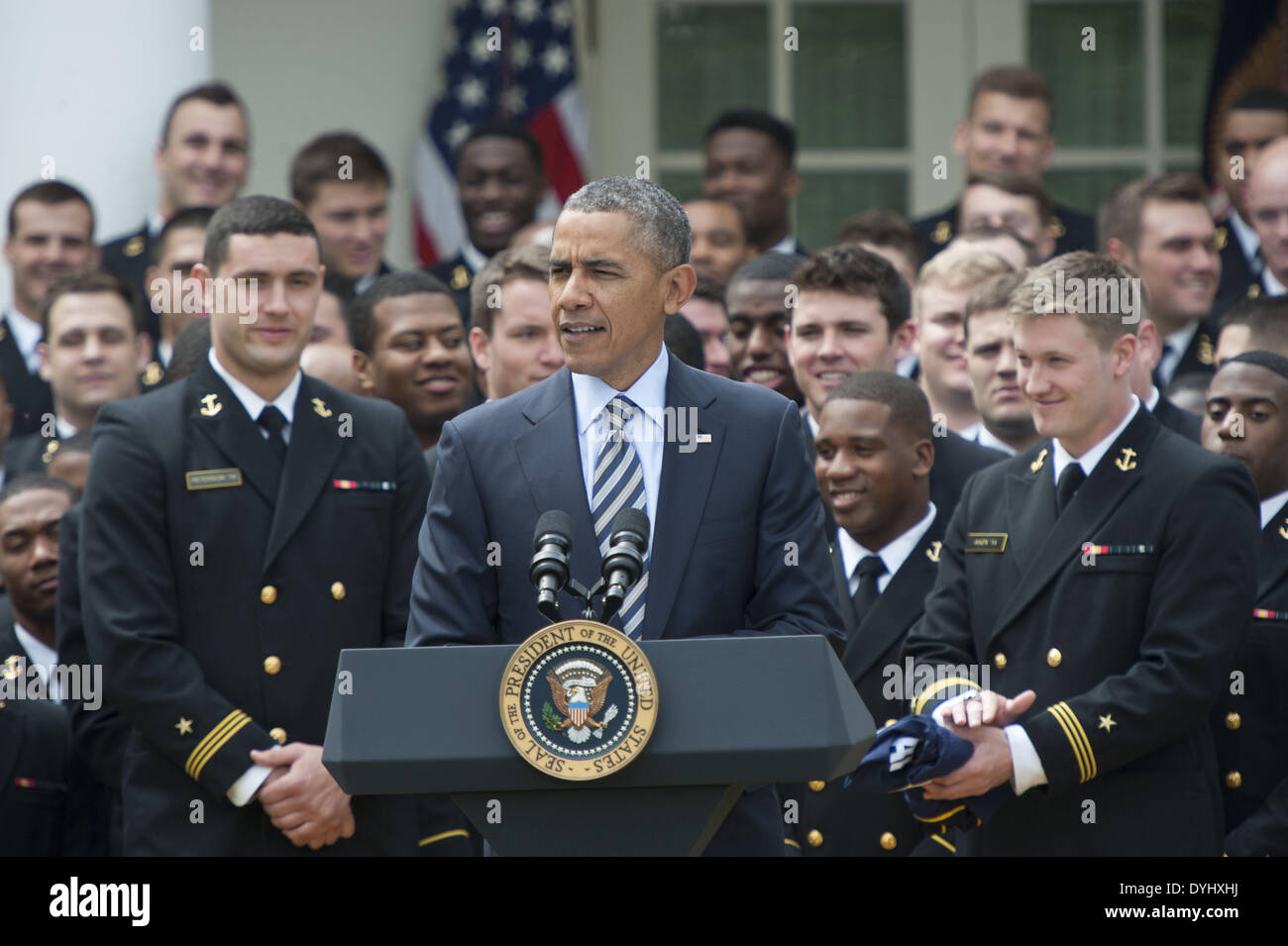 Washington, District Of Columbia, USA. 18th Apr, 2014. PRESIDENT OBAMA welcomes the Naval Academy Midshipmen Football Team to the White House to present them with the 2013 Commander-in-Chief Bowl. The ceremony was held in the Rose Garden of the White House Credit:  Ricky Fitchett/ZUMAPRESS.com/Alamy Live News Stock Photo