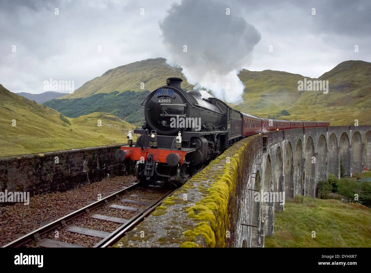 the jacobite steam train crossing the glenfinnan viaduct Stock Photo