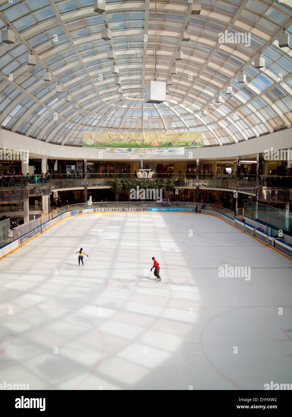 A couple of figure skaters practice at the Ice Palace skating rink at West Edmonton Mall in Edmonton, Alberta, Canada. Stock Photo