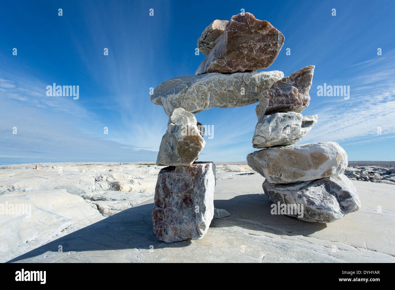 Canada, Nunavut Territory, Inukshuk rock sculpture on Marble Island along Hudson Bay Stock Photo