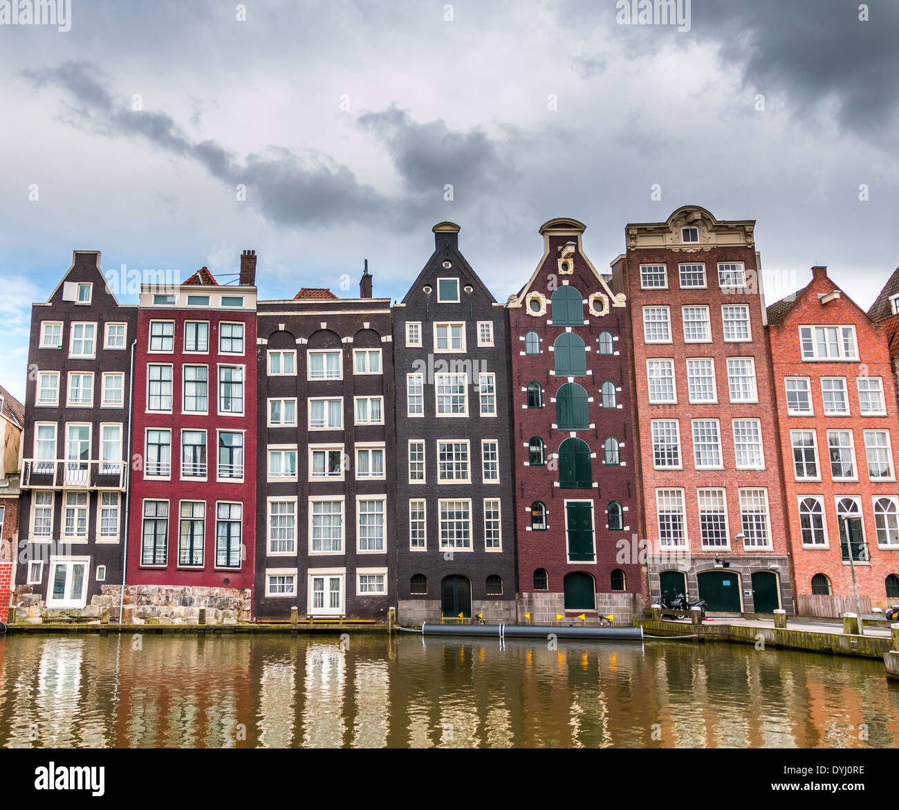 16  to 17 century homes along canals in Amsterdam , Holland Stock Photo