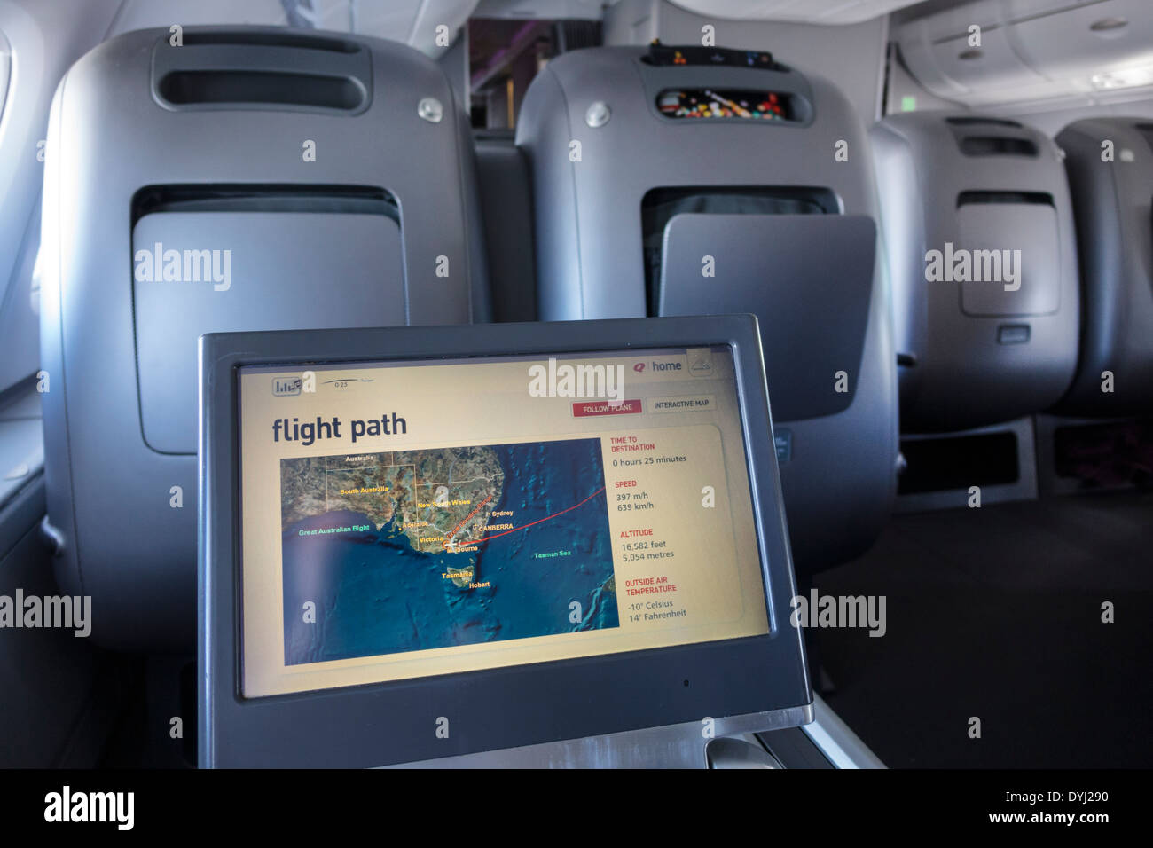 Melbourne Australia,Qantas,airlines,onboard,flight,passenger cabin,class,monitor,flight path,information,AU140307006 Stock Photo