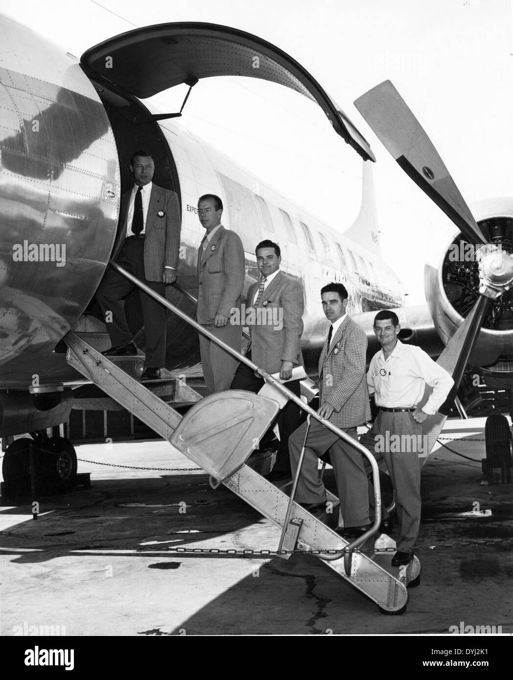 This image features Lou Hoffman, Chief Test Pilot for the Convair 240, one of the early twin-engine airliners. The Convair 240 was used for both commercial and military purposes during the 1940s and 1950s, contributing to the development of civilian and military aviation. Stock Photo