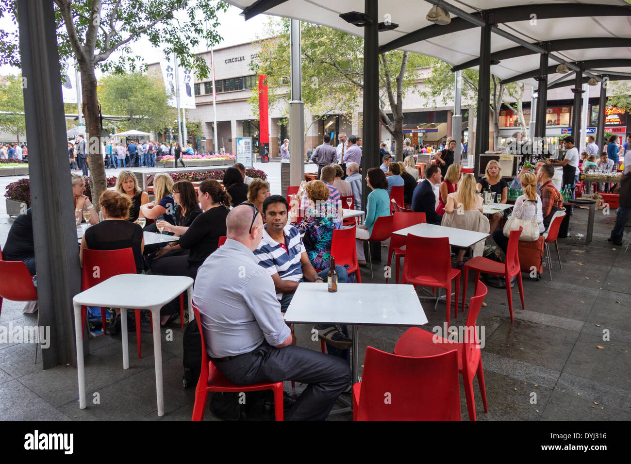 Sydney Australia,restaurant restaurants food dining cafe cafes,bar lounge pub,al fresco sidewalk outside tables,dining,office workers,after work,man m Stock Photo