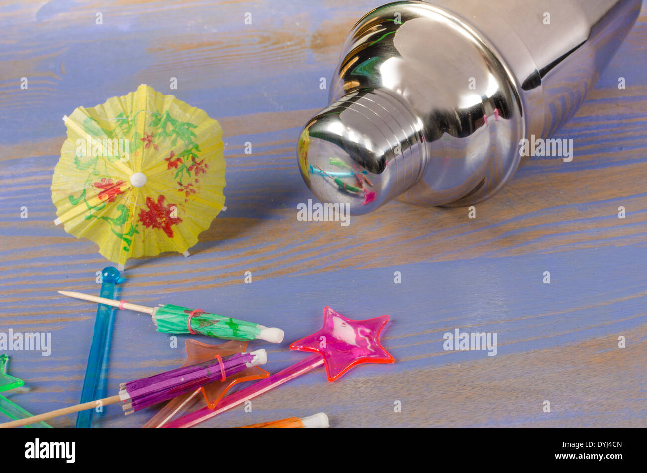 Cocktail shaker and an assortment of decorative accessories Stock Photo