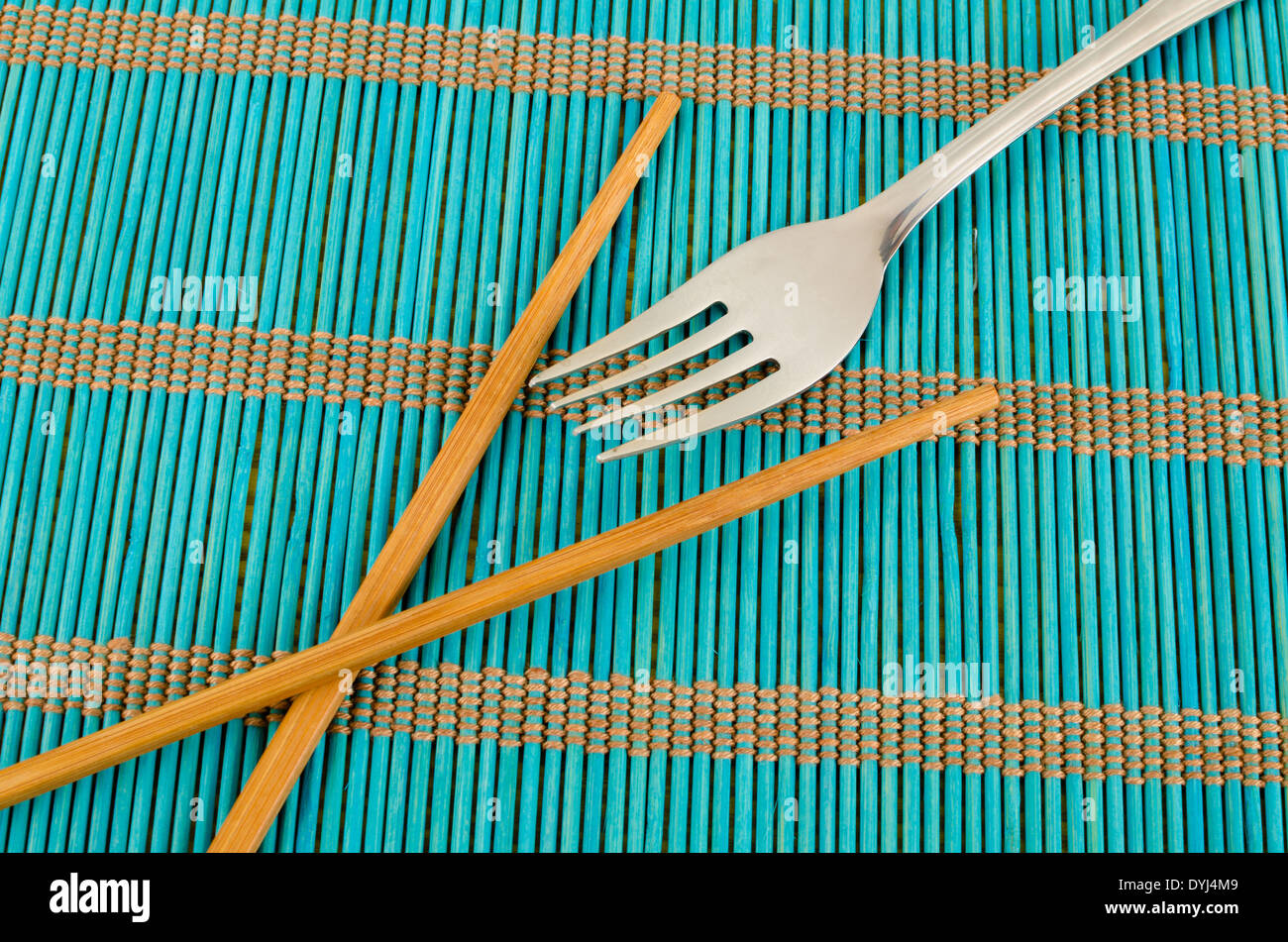Chopsticks or fork, a still life with a cultural concept Stock Photo Alamy