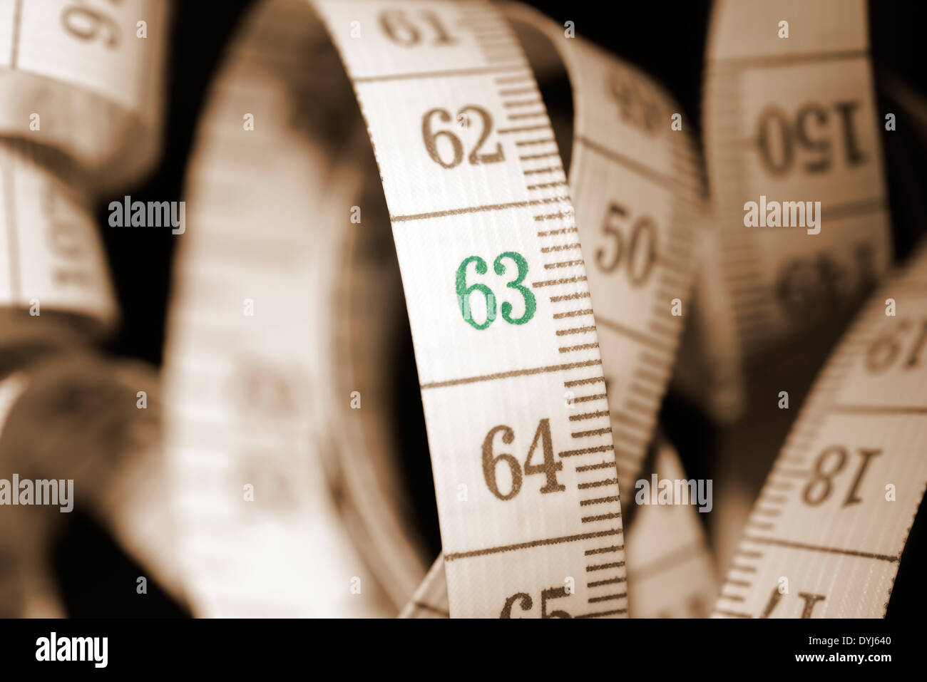 Maßband mit der Zahl 63, Symbolfoto Rente mit 63 Stock Photo