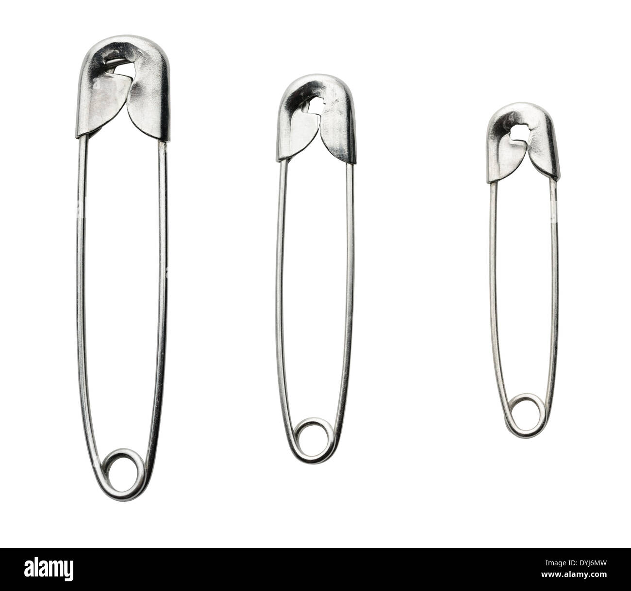 Three closed safety pins isolated on white background Stock Photo Alamy