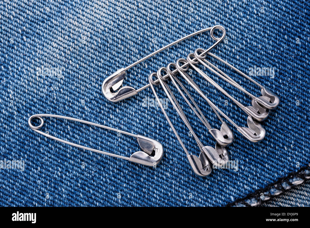 Safety Pins on Clothes with Label Stock Image - Image of close, label:  80500473