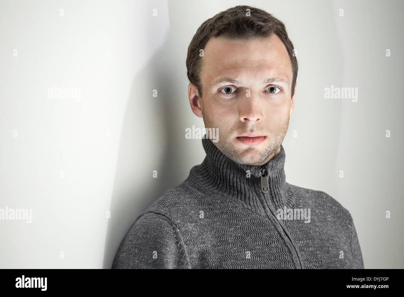 Portrait of young handsome Caucasian man on white background Stock Photo