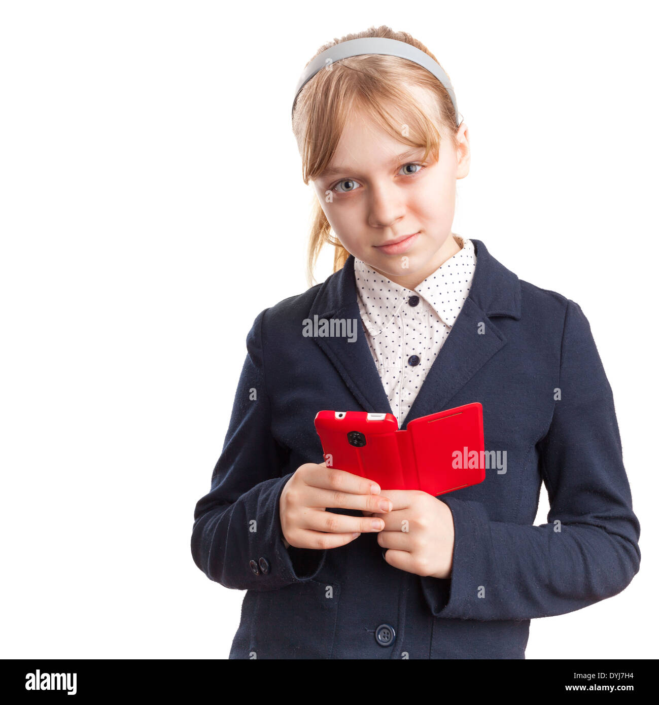 Portrait isolated on white. Blond Caucasian schoolgirl with mobile phone Stock Photo