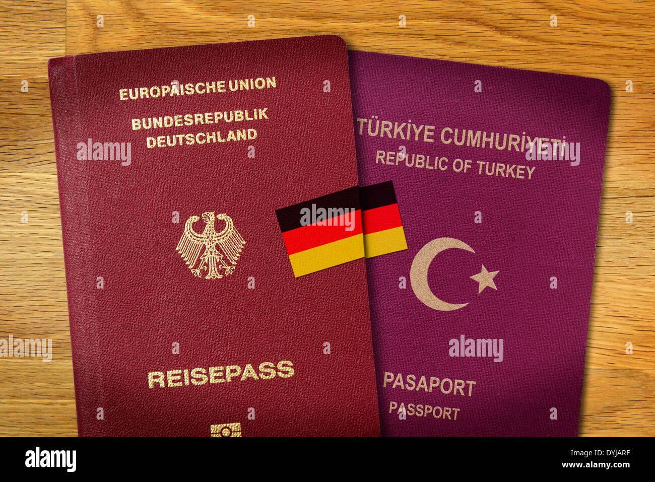 German and Turkish passport, dual citizenship, Deutscher und türkischer Pass mit Deutschlandfahne, doppelte Staatsbürgerschaft Stock Photo
