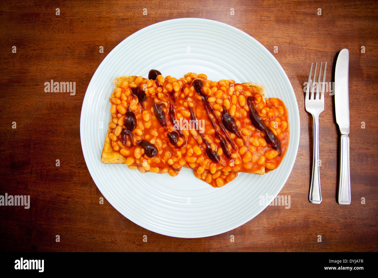 Beans on toast with brown sauce Stock Photo Alamy